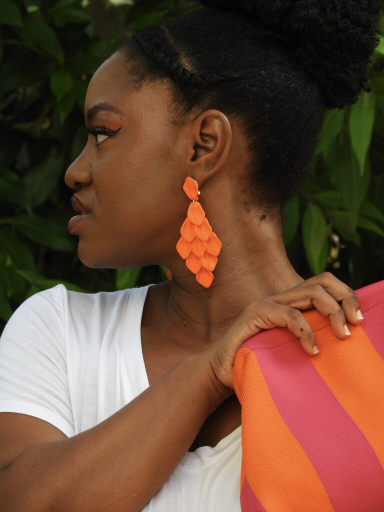 Dangle earrings and dumpling bag